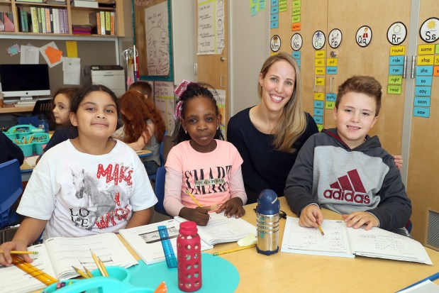 Principal Jessica Orleans is pictured with students at The River School P.S. 281 in this file photo. (Photo by Andrew Schwartz)