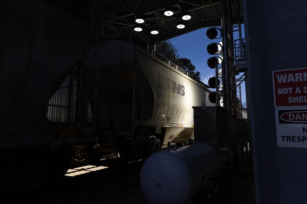 A Norfolk Southern train passes through a digital train inspection portal in Jackson on Friday, March 7, 2025. (Arvin Temkar/AJC)
