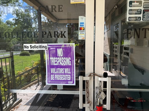 Healthcare at College Park, a nursing home in Fulton County, stands shuttered with its door chained on July 26, 2025, having closed in recent months. It was on Brown University's list of U.S. nursing homes at elevated risk of closing due to the "One Big, Beautiful Bill Act's" cuts to Medicaid.  (Ariel Hart/AJC)