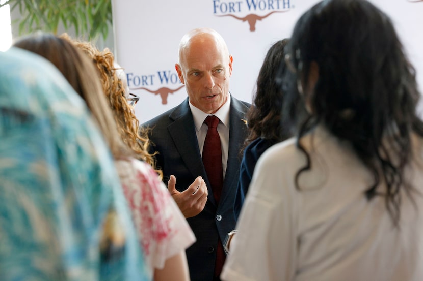 Robert Alldredge, the interim chief of the Fort Worth Police Department, speaks attendees...