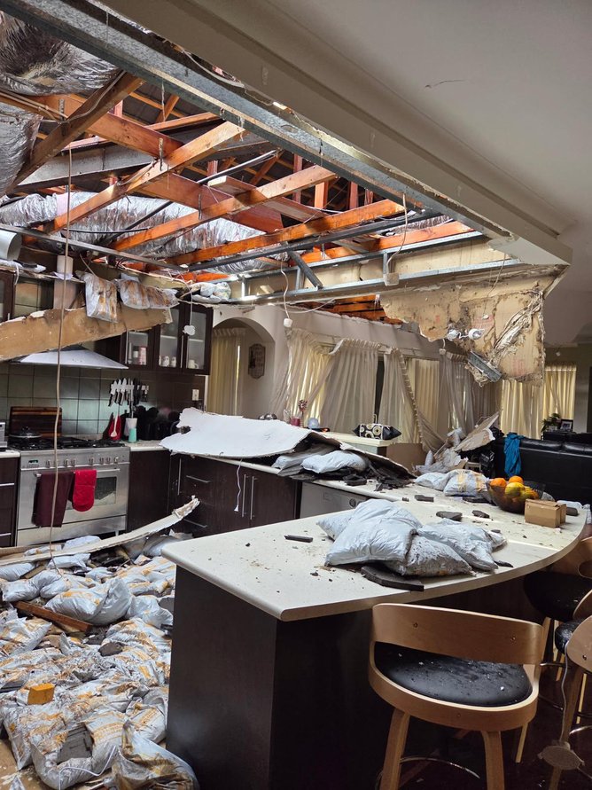 Reita Sheridan has shared images of the storm damage at her house on Harrington Waters Drive, Waikiki. 
