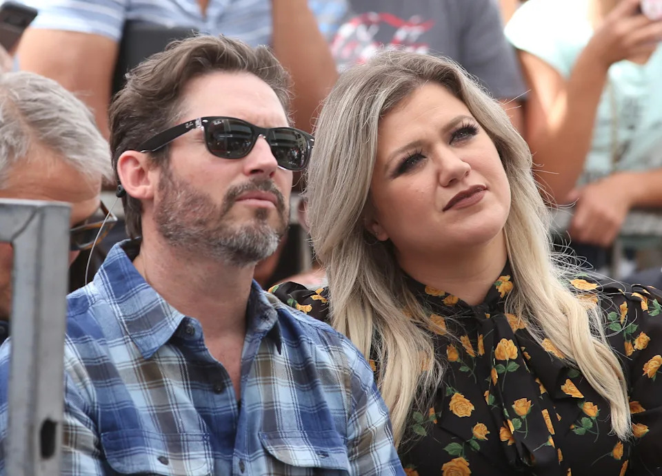 Brandon Blackstock and Kelly Clarkson attend a ceremony honoring Simon Cowell's star on the Hollywood Walk of Fame, Aug. 22, 2018.