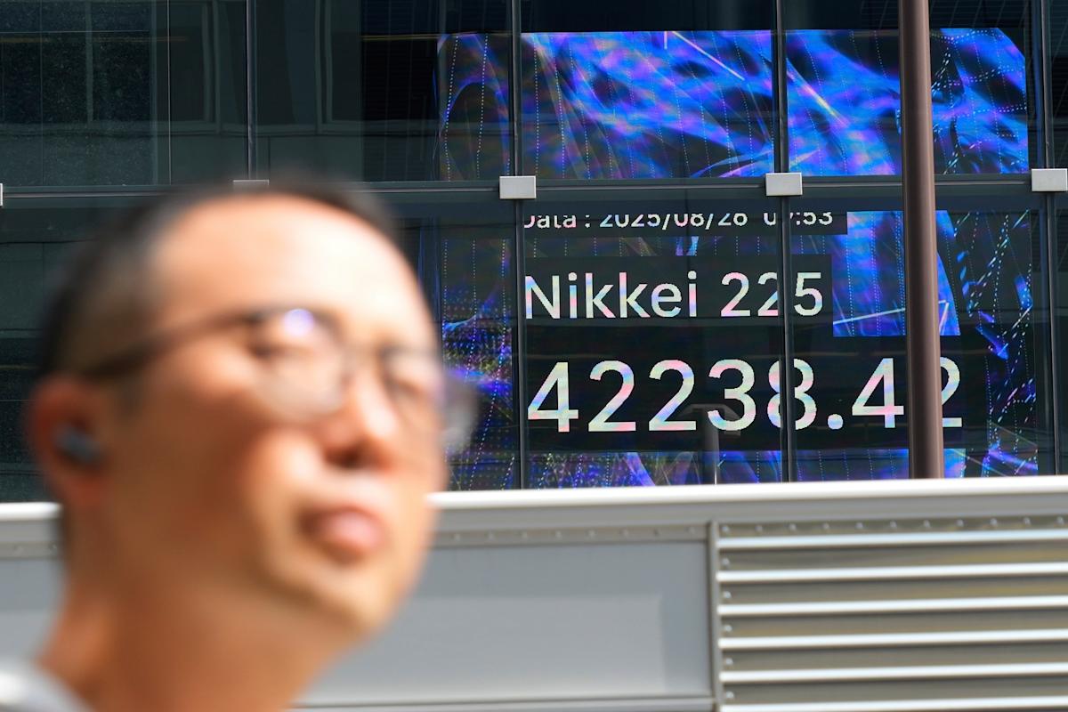 Asian shares are mixed, with Chinese benchmarks sinking ahead of Nvidia earnings update