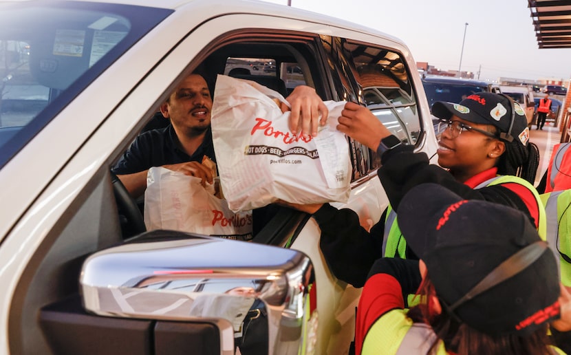 Spillover from the drive-through lane at Portillo's in The Colony in 2023 bled out onto a...