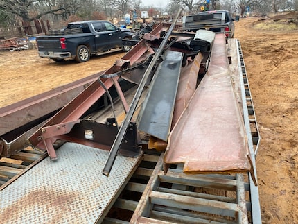 Trailer delivering steel to George Tobolowsky's "Recycled Glass House."