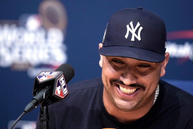 New York Yankees pitcher Nestor Cortes answers a question during a news conference before Game 1 of the baseball World Series, Friday, Oct. 25, 2024, in Los Angeles. (AP Photo/Julio Cortez)