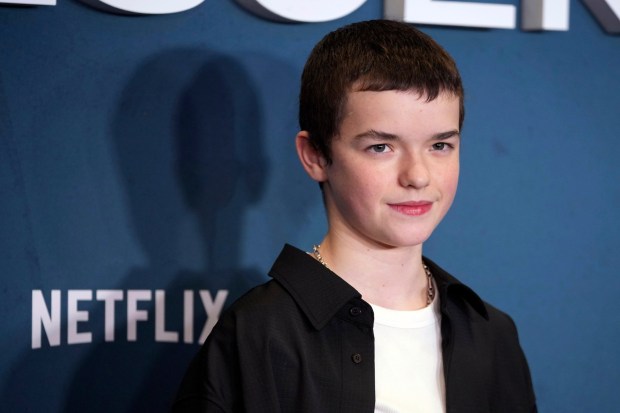 Owen Cooper arrives at the special screening for "Adolescence" in London on March 12, 2025. The engrossing drama on Netflix leaves no stone and no emotion unturned and is must-see TV, our reviewer says. (AP Photo/Kin Cheung)