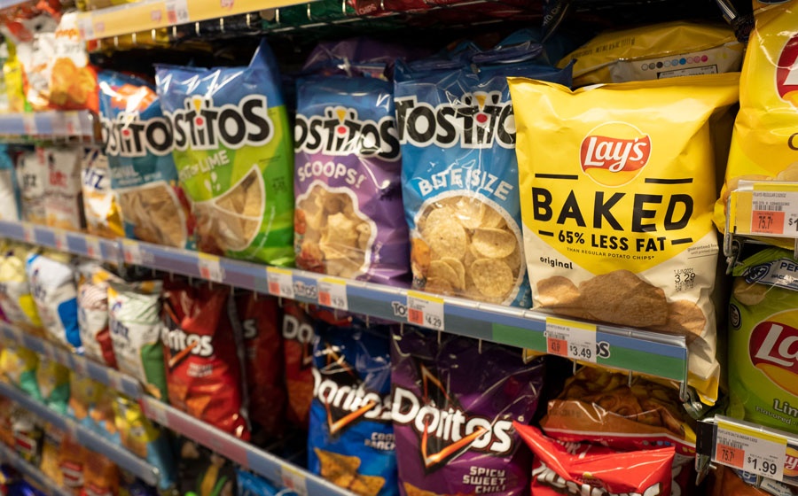 Potato chips are displayed at a store in New York, March 25, 2021.