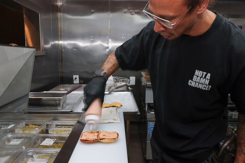 NADC Burger uses Martin's Potato Buns. Each side is ribboned with a generous amount of...