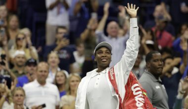 Venus Williams waves to fans