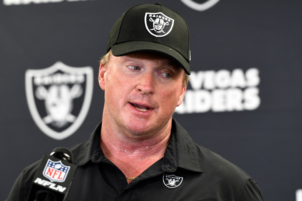 Jon Gruden speaks with the media following an NFL football game against the Pittsburgh Steelers in Pittsburgh, Sept. 19, 2021. 