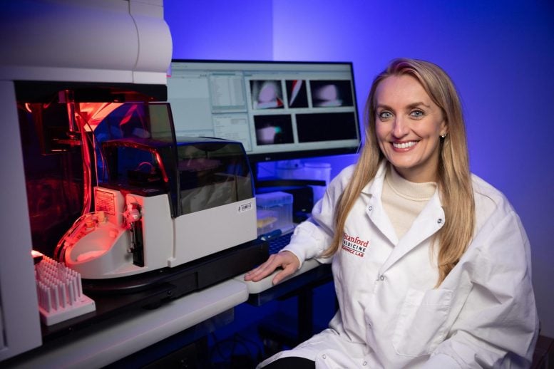 Agnieszka Czechowicz Sits at a Flow Cytometer