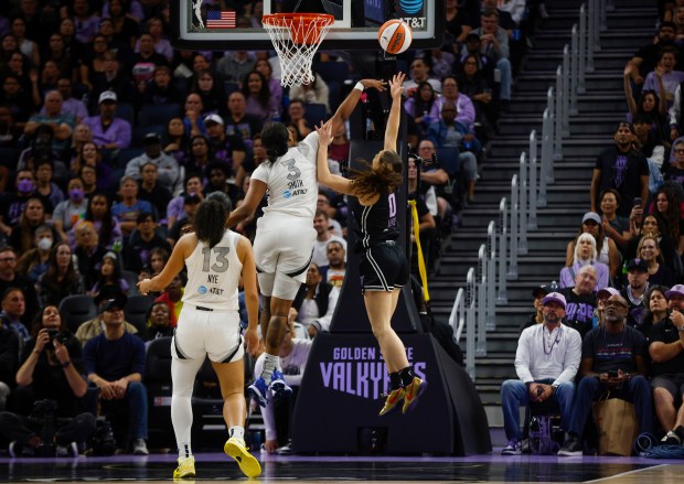 Valkyries' Carla Leite (0) takes a shot against The Las Vegas Aces' NaLyssa Smith (3) and The Las Vegas Aces' Aaliyah Nye (13) in the fourth quarter at the Chase Center in San Francisco, Calif., on Wednesday, Aug. 6, 2025. (Shae Hammond/Bay Area News Group)
