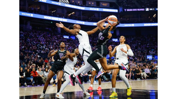 Valkyries' VeronicaBurton (22) takes a shot agains The Las Vegas Aces' Chelsea Gray (12) and The Las Vegas Aces' A'ja Wilson (22) in the third quarter at the Chase Center in San Francisco, Calif., on Wednesday, Aug. 6, 2025. (Shae Hammond/Bay Area News Group)