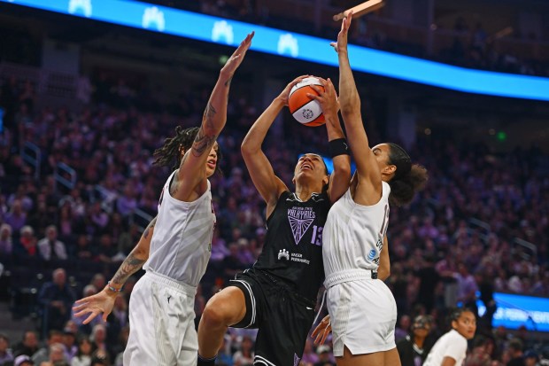 Golden State Valkyries' Janelle Salaun (13) goes up for a lay up against Atlanta Dream's Brittney Griner (42) and Atlanta Dream's Nia Coffey (12) in the first quarter of their WNBA game at Chase Center in San Francisco, Calif., on Sunday, Aug. 17, 2025. (Jose Carlos Fajardo/Bay Area News Group)