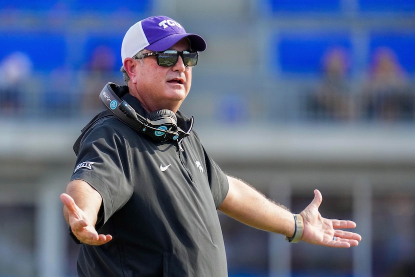 TCU head coach Sonny Dykes reacts to a call during the first half of an NCAA college...