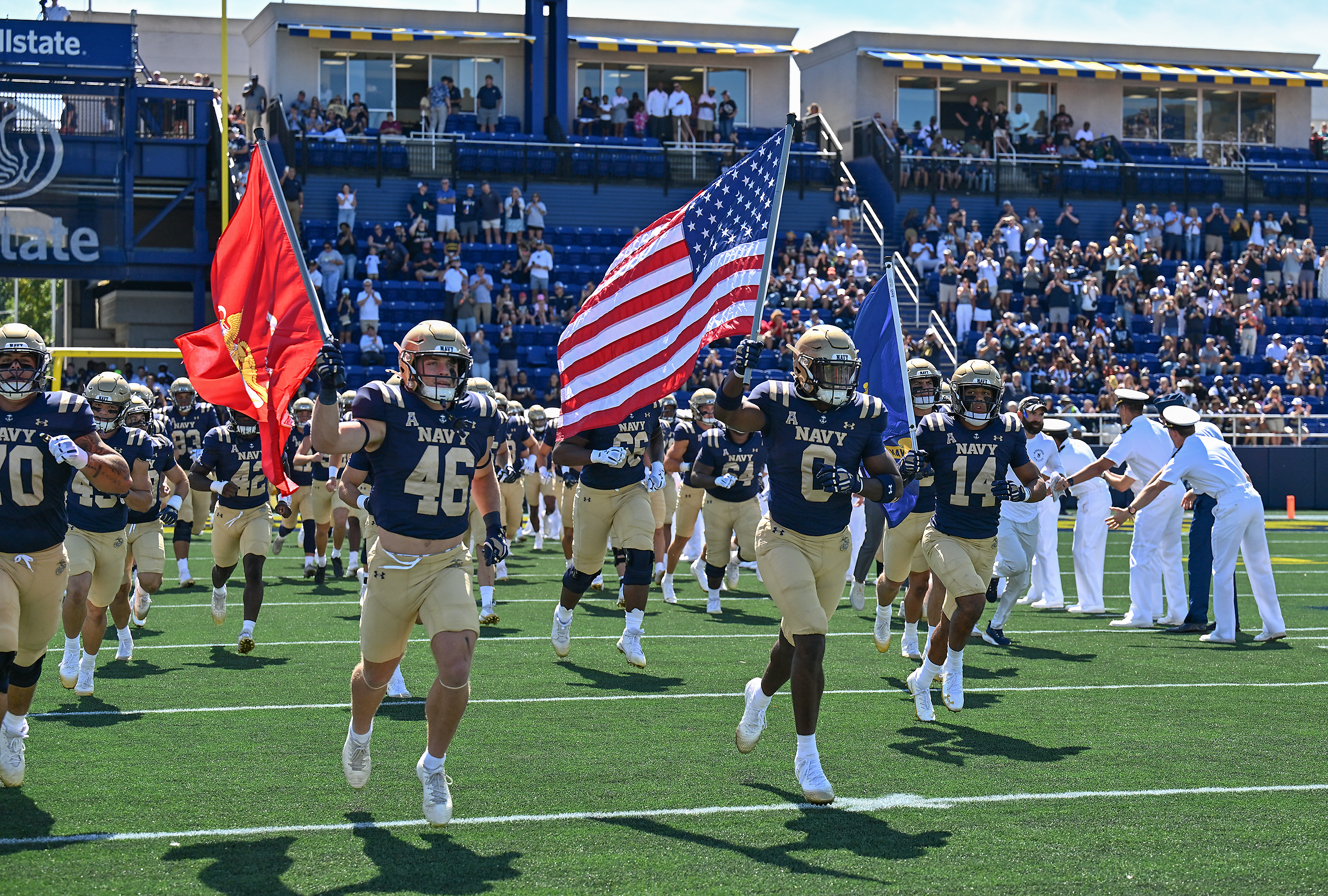 The Midshipmen take the field. The Navy Midshipmen play their NCAA football season opener at home against the visiting VMI Keydets at Navy-Marine Corps Memorial Stadium in Annapolis. (Paul W. Gillespie/Staff)
