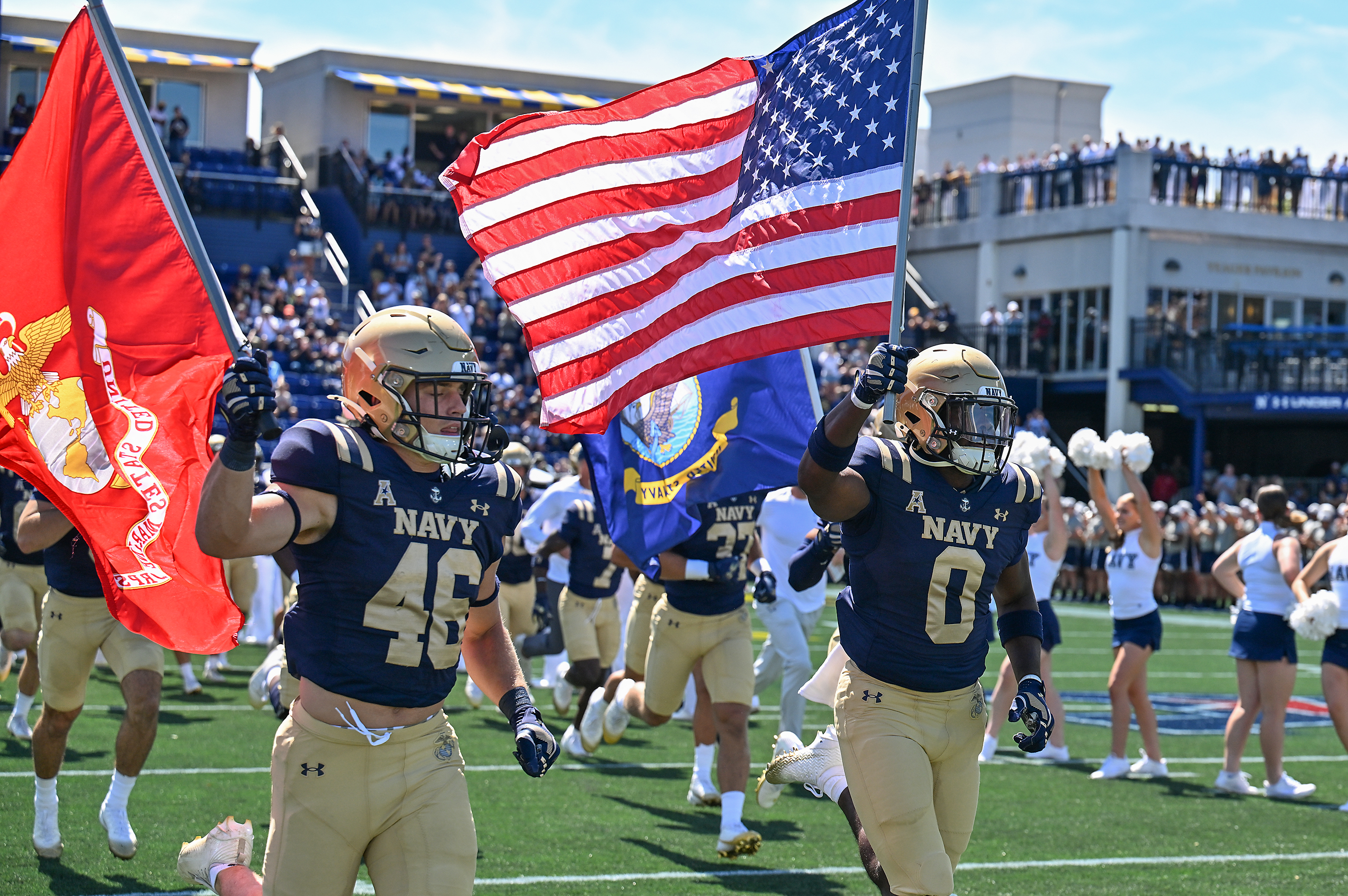 The Midshipmen take the field. The Navy Midshipmen play their NCAA football season opener at home against the visiting VMI Keydets at Navy-Marine Corps Memorial Stadium in Annapolis. (Paul W. Gillespie/Staff)