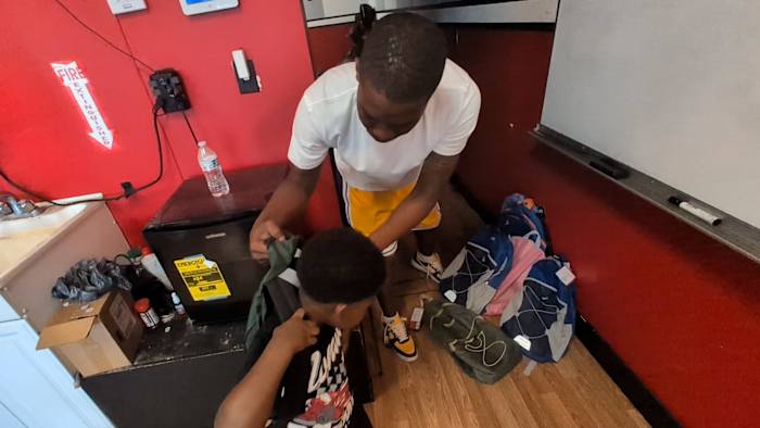 Northside Jacksonville barbershop holds 5th annual back-to-school giveaway