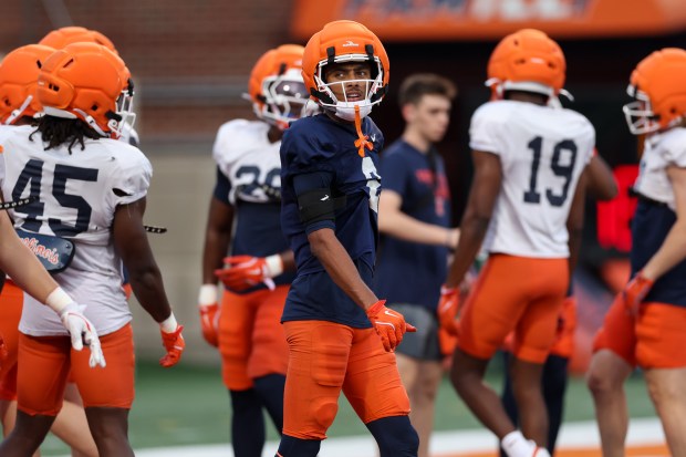 Illinois wide receiver Ashton Hollins walks on the field during practice at Memorial Stadium on Aug. 7, 2025, in Champaign. (Armando L. Sanchez/Chicago Tribune)