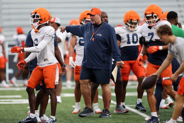 Illinois coach Bret Bielema runs practice at Memorial Stadium on Aug. 7, 2025, in Champaign. (Armando L. Sanchez/Chicago Tribune)