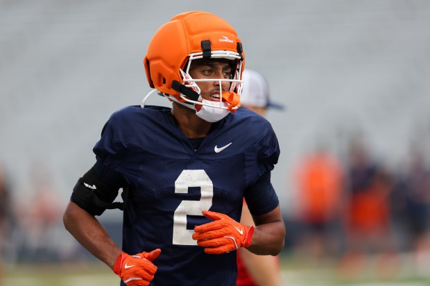 Illinois wide receiver Ashton Hollins runs on the field during practice at Memorial Stadium on Aug. 7, 2025, in Champaign. (Armando L. Sanchez/Chicago Tribune)