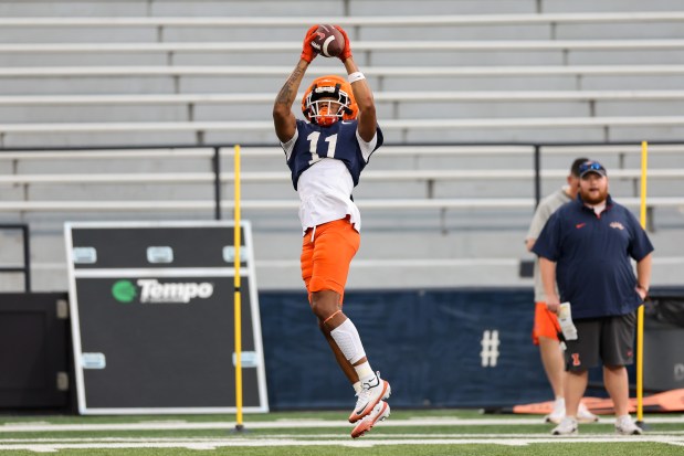 Illinois wide receiver Brayden Trimble makes a catch during practice at Memorial Stadium on Aug. 7, 2025, in Champaign. (Armando L. Sanchez/Chicago Tribune)