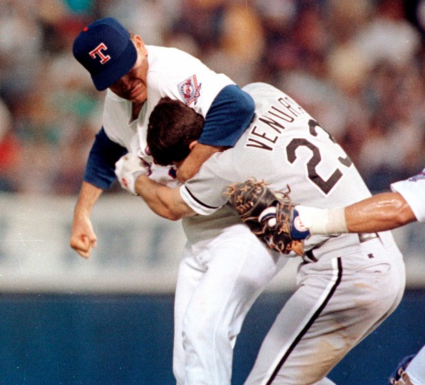 Texas Rangers pitcher Nolan Ryan hits Robin Ventura of the Chicago White Sox after Ventura charged the mound, in Arlington, Texas on Aug. 4, 1993. (Linda Kaye/AP)