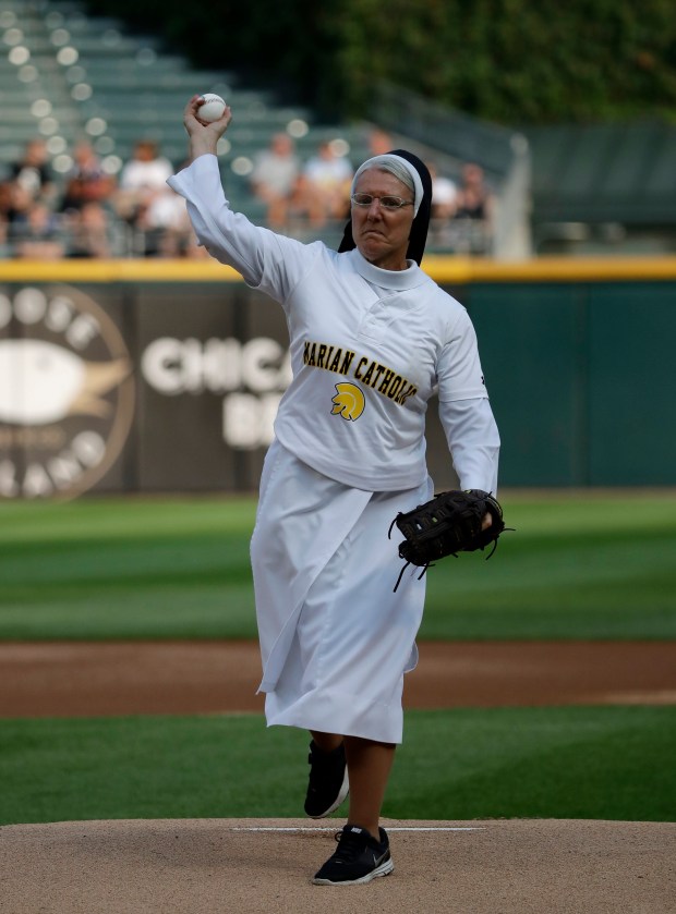 Sister Mary Jo Sobieck throws out a ceremonial first pitch before a baseball game between the Kansas City Royals and the Chicago White Sox on Aug. 18, 2018, in Chicago. (Nam Y. Huh/AP)