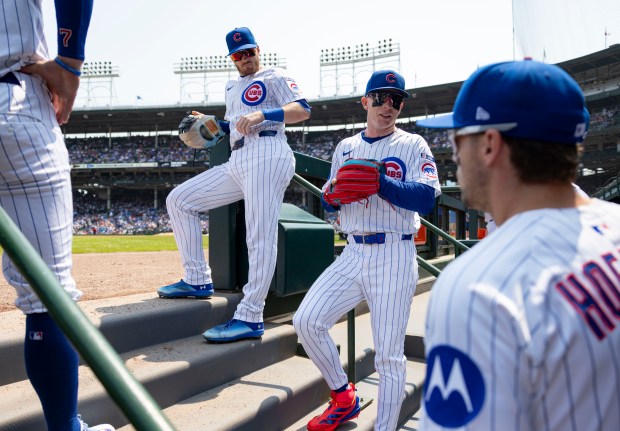 Chicago Cubs outfielders Ian Happ, Pete Crow-Armstrong and teammates prepare to face the Baltimore Orioles on Sunday, Aug. 3, 2025, at Wrigley Field. (Brian Cassella/Chicago Tribune)