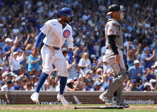 Chicago Cubs outfielder Willi Castro scores against the Baltimore Orioles in the sixth inning as they take the lead Sunday, Aug. 3, 2025, at Wrigley Field. (Brian Cassella/Chicago Tribune)