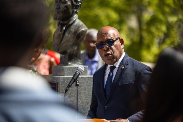 Consul General of Haiti Jean Joseph Leandre speaks during a...