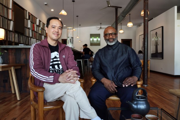 Nigel Ridgeway, left, and Theaster Gates at A Listening Space, 305 E. Garfield Boulevard in Chicago on June 16, 2025. The listening room has hundreds of recordings and people sit and drink tea. (Terrence Antonio James/Chicago Tribune)