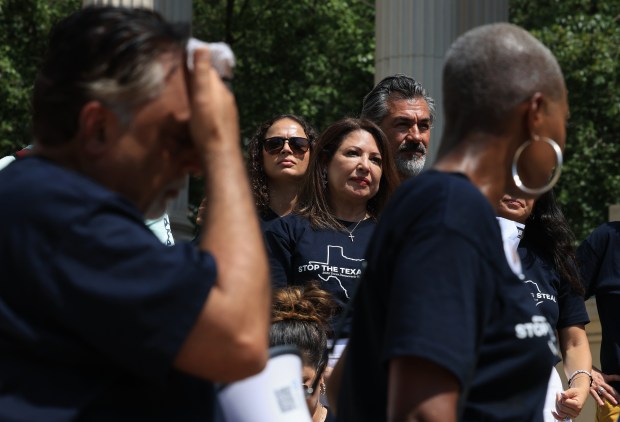 Texas House Democrats attend a rally by local supporters at...