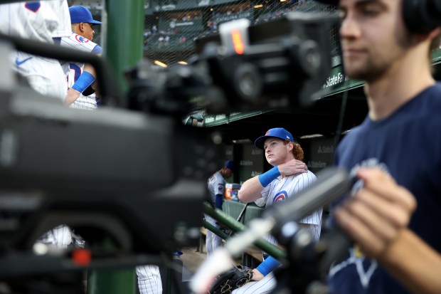 Chicago Cubs right fielder Owen Caissie prepares to take the field for Game 2 of a doubleheader against the Milwaukee Brewers at Wrigley Field in Chicago on Aug. 19, 2025. (Chris Sweda/Chicago Tribune)