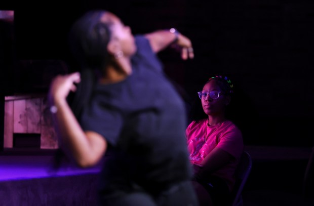 Production assistant apprentice Mariah Brown, 17, looks on as a...