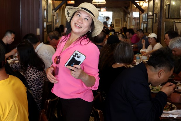 Catherine Wang, a Malaysian Fujian, and outgoing president of the Chicago Fujian Association, visits Pizzeria Due in Chicago, Aug. 28, 2025. (Antonio Perez/Chicago Tribune)