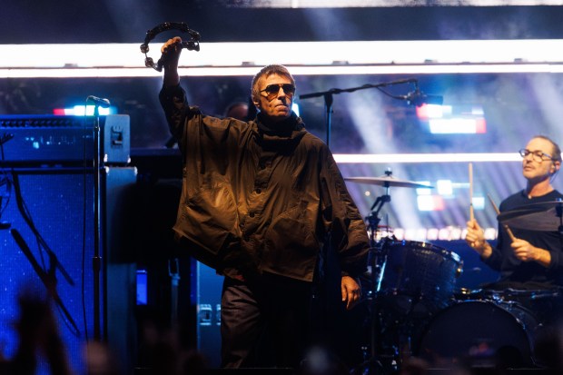 Liam Gallagher, lead singer of Oasis performs with members of the band at Soldier Field on Aug. 28, 2025, in Chicago. (Armando L. Satnchez/Chicago Tribune)