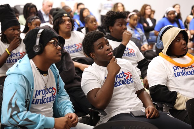Teens watch as anti-gun violence social media campaigns are presented at the Project Unloaded competition, Aug. 1, 2025. (Antonio Perez/Chicago Tribune)