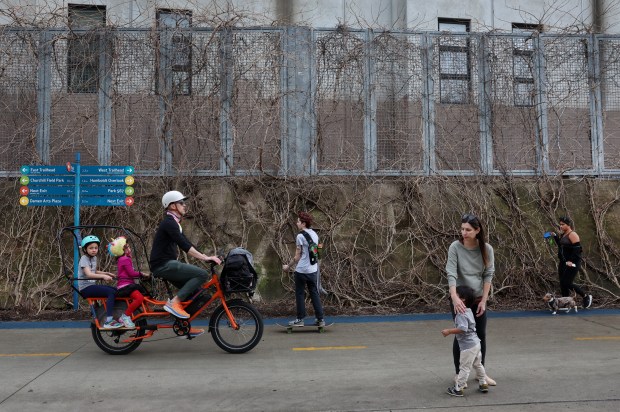 People take advantage of the unseasonably warm weather to exercise...