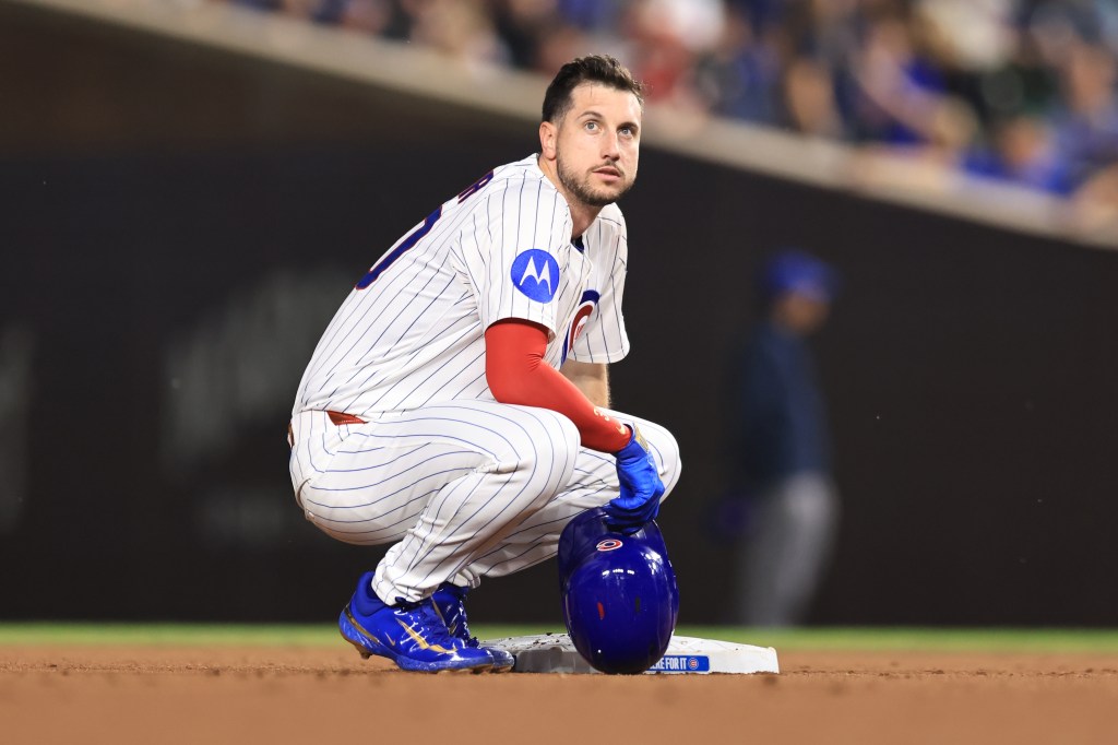 Chicago Cubs' slugger Kyle Tucker on the bench