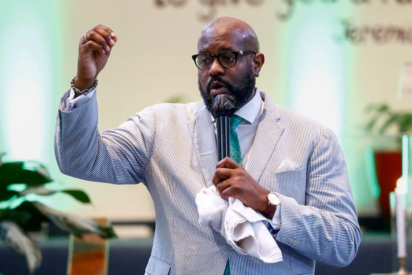 Rev. Michael Waters gives his sermon during a youth-led service at Abundant Life African...