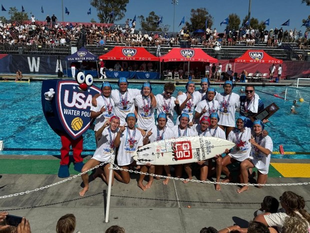 The Del Mar Water Polo Club's 16U Boys Blue team displays the championship trophy and their excitement for the hard-fought victory against their cross-town rival.Back row (l-r): Ethan Diep, Grayson Taylor, Max Kellerman, Maximus Bruhn, Diego Dantas, Sebastian Nudleman, George Hodgkinson, Hanrui Liu, Coach Kaden Likins; Front row (l-r): Luke Anderson, Sungwon Aden Shin, Areli Kesser, Jack Davis, Logan Rorye, Grady Alonso, Sebastian Guido, Noah Zakrzewski (Photo by Alla Kesser)