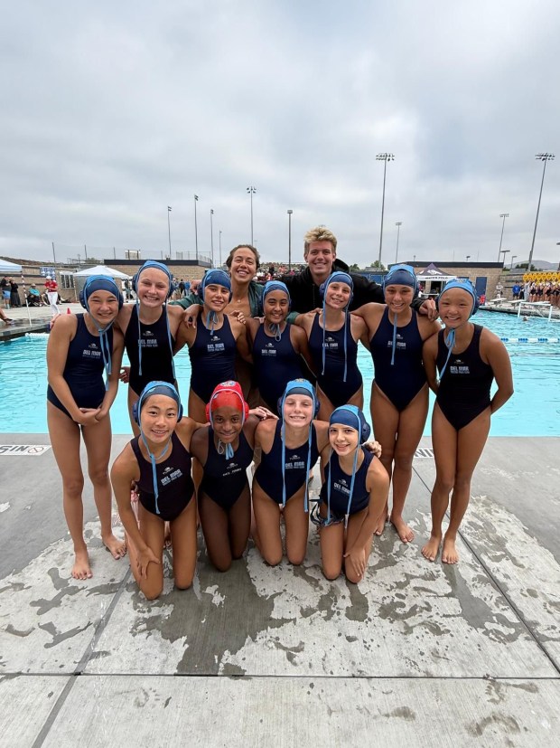 Del Mar Water Polo Club's 12U Girls' Blue team is all smiles as they celebrate their dramatic upset victories over some of the nation's top teams.Back row (l-r): Lyla Richardson, Lolo Wendler, Coach Sarah Lizotte, Francesca Garcia, Coach Mark Laurlund; Front row, l-r: Olivia Li, Abigail Lickel, Ainsley Harp, Scarlett Mason (Andrea Garcia)