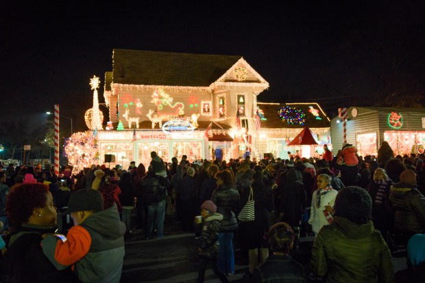 Neighborhood residents attend a Christmas light ceremony at the office of Brooklyn Democratic Chairman Frank Seddio in 2015.
