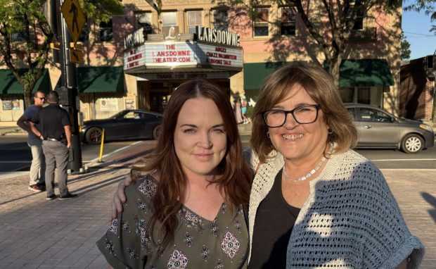 Sisters Kelly Sacchetti, left, and Betty Ann Mager were among the crowd at the first show at the Lansdowne Theater in decades. (KATHLEEN E. CAREY - DAILY TIMES)