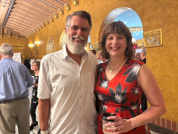 Steve Eberle, left, and Donna Kelly Romero, both board members of the Historic Lansdowne Theater Corp., enjoy the opening of the theater. (KATHLEEN E. CAREY - DAILY TIMES)