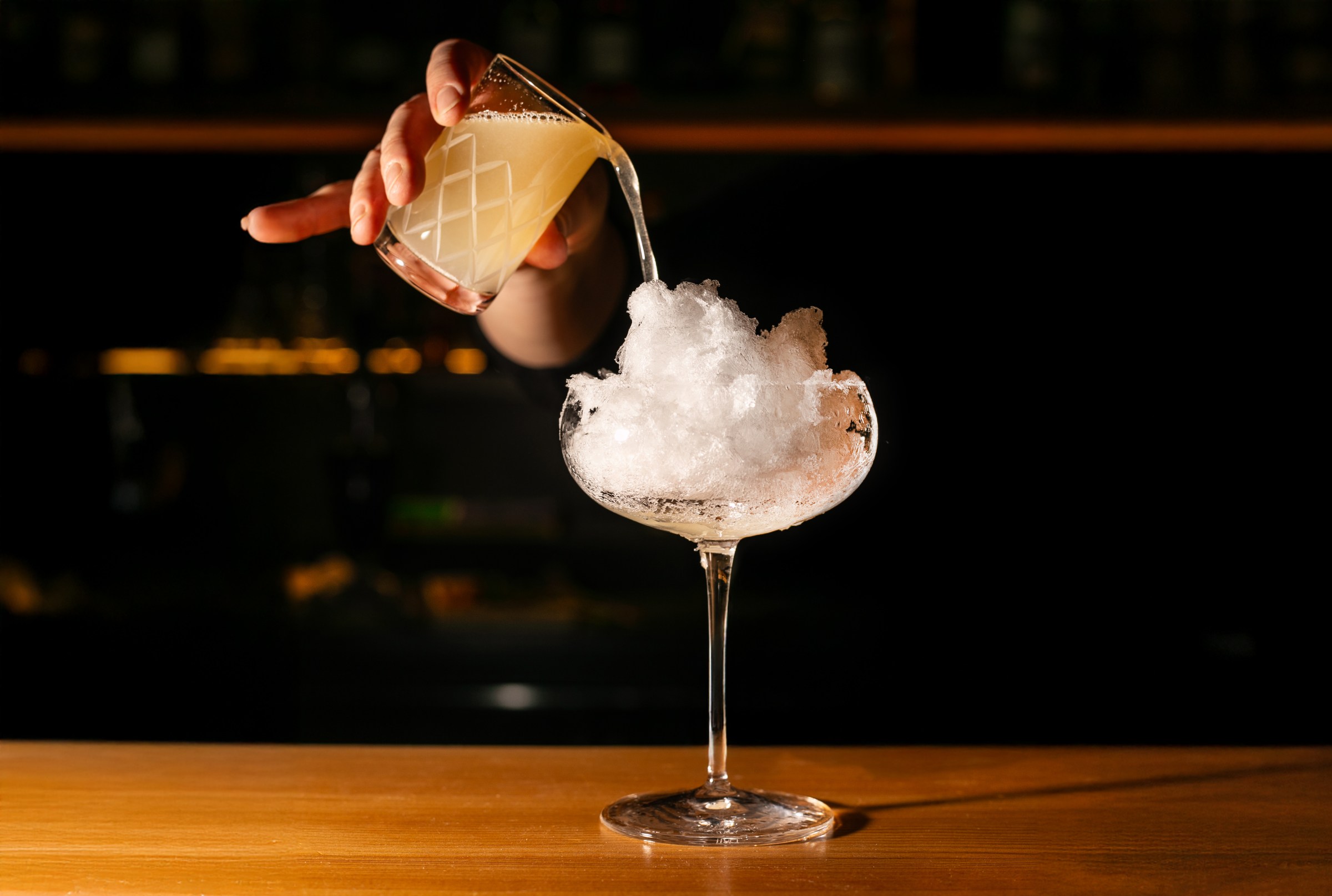 A daiquiri that looks like a cloud in a glass.