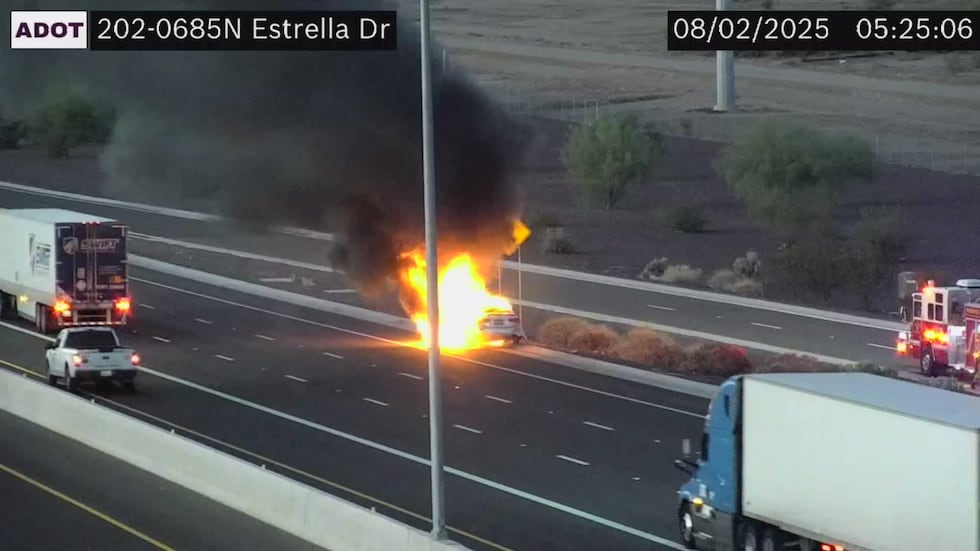 Traffic cameras showed one vehicle on fire as emergency crews worked to put out flames.
