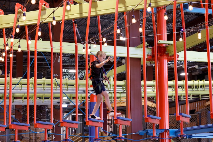 A boy plays at Fritz's Adventure, Friday, July 18, 2025, in The Colony. 